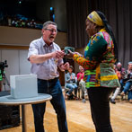 International Ceramics Festival 2019 - Aberystwyth. Magdalene Odundo receiving the Potterycrafts ‘Lifetine Achievement Award from Ken Shelton